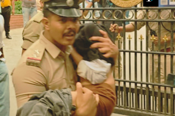 Tragedy at RCB Victory Parade: Unraveling the Stampede in Bengaluru Police officer saving a child during Bengaluru Stampede